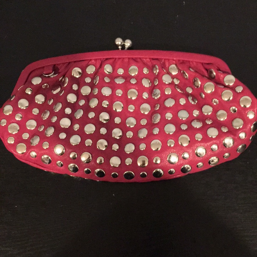 Silver studded clutch never used, wristlet/chain